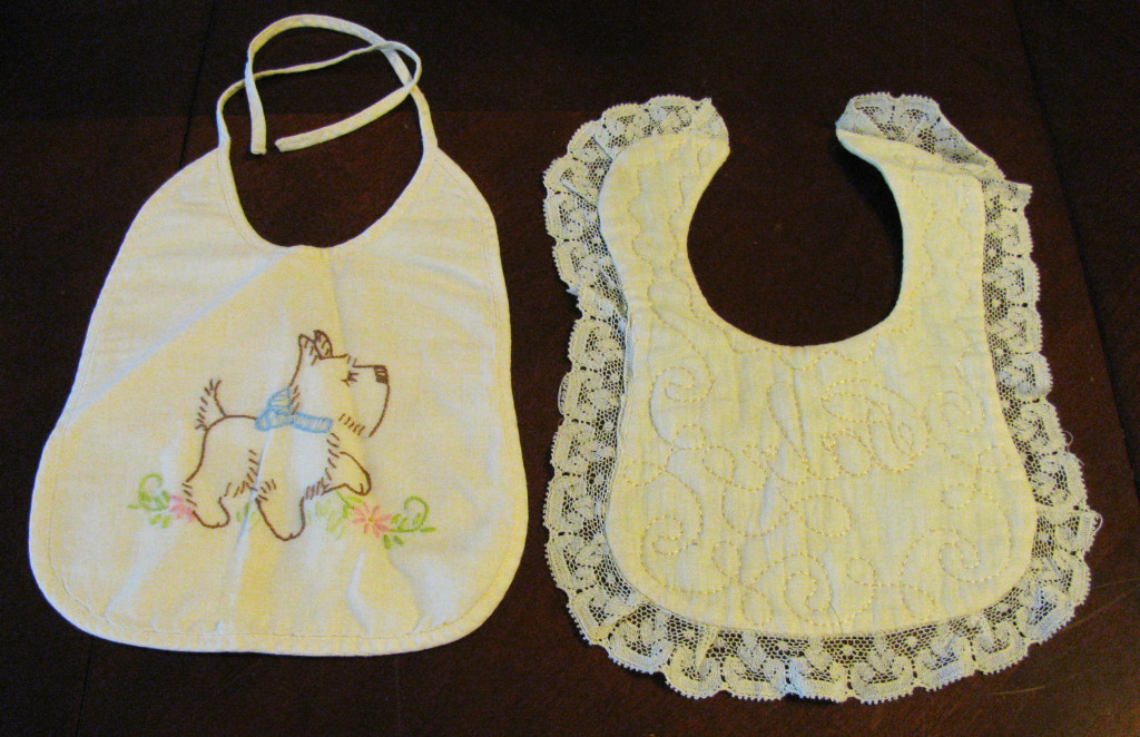 Two bibs Mom made for my layette.  